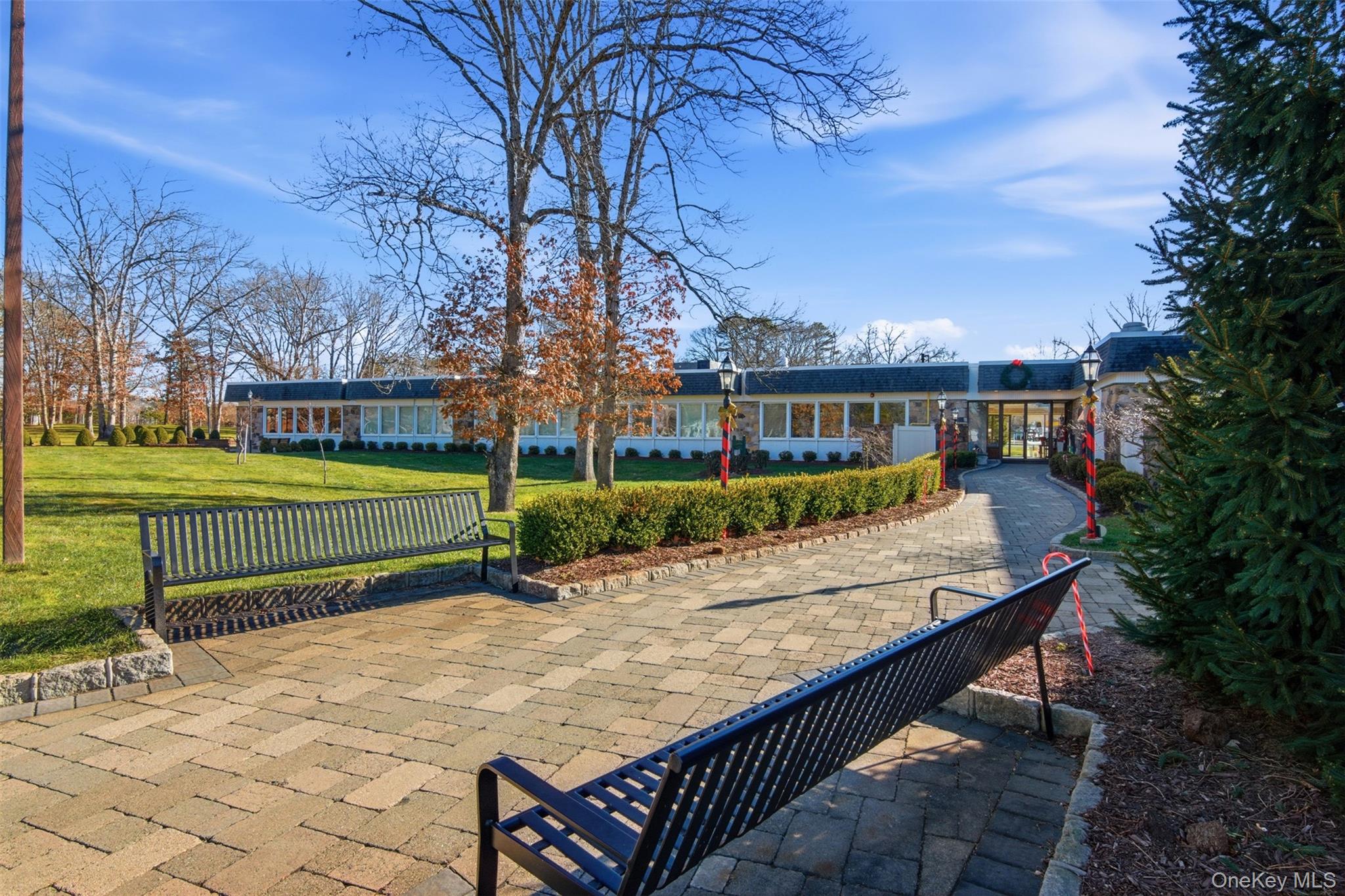 360 Woodbridge Drive, Unit A Ridge, NY 11961 - Photo 26 of 34 a view of a terrace with a yard