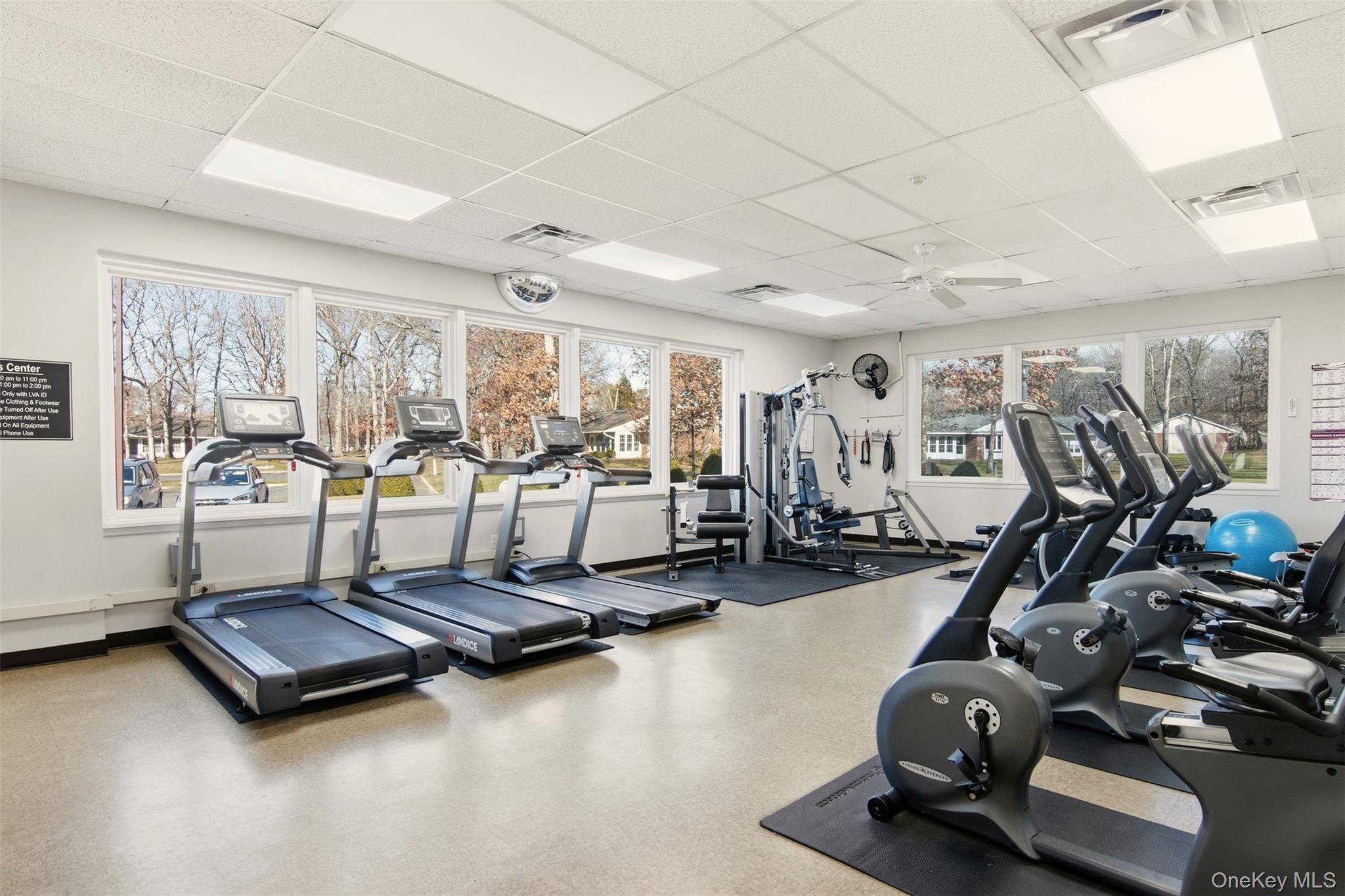 360 Woodbridge Drive, Unit A Ridge, NY 11961 - Photo 31 of 34 a room with gym equipment
