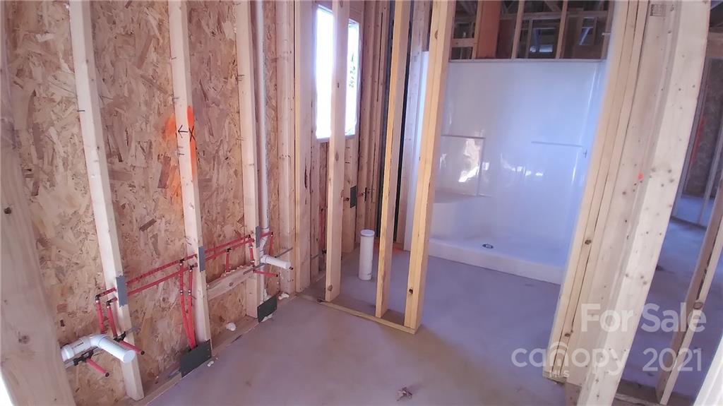 2173 State Rd S-46-1474, Unit 10 Clover, SC 29710 - Photo 9 of 10 a bathroom with a bathtub and shower