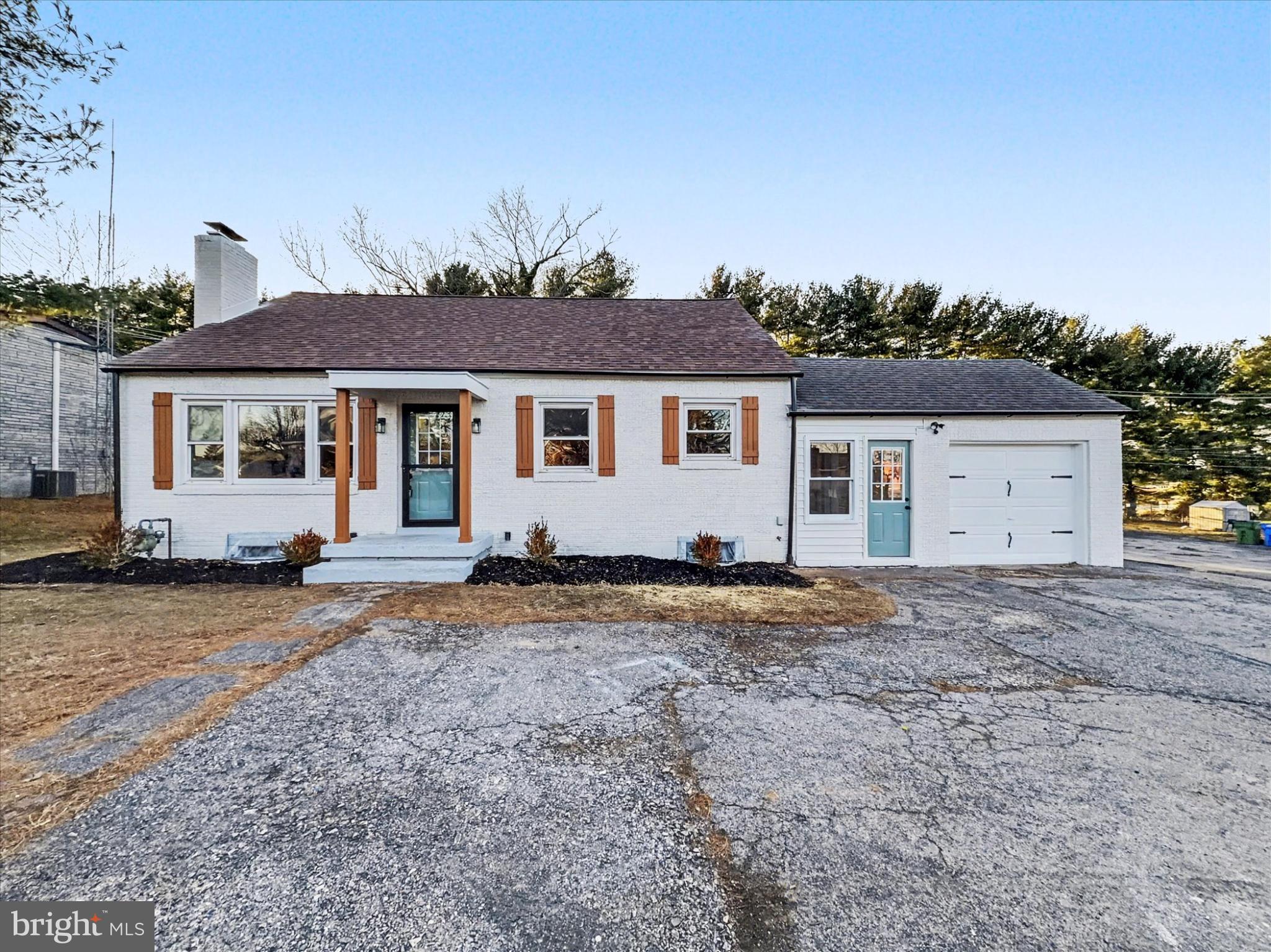 2196 South Queen Street York, PA 17402 - Photo 1 of 28 a yard that is sitting in front of a house