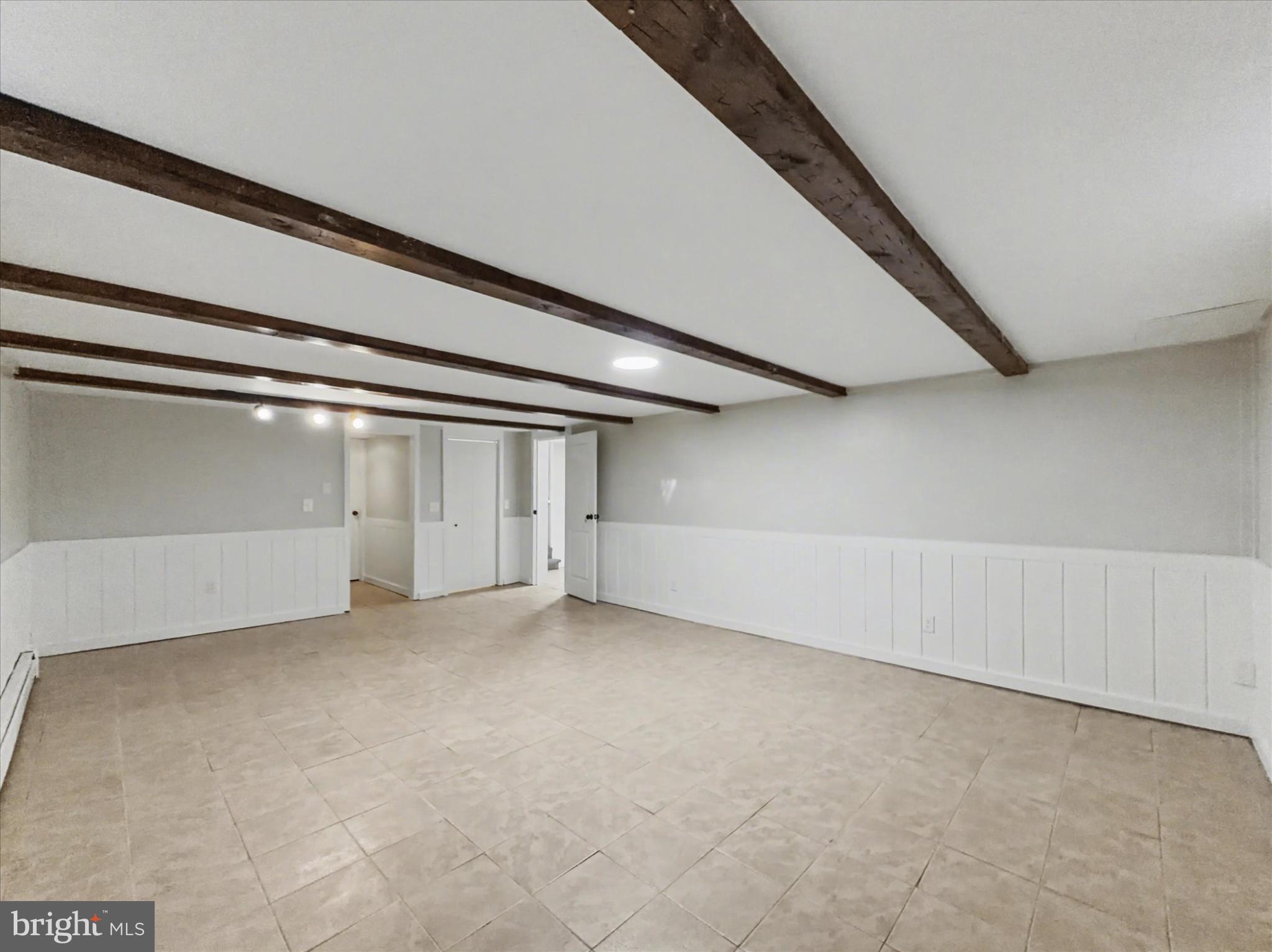 2196 South Queen Street York, PA 17402 - Photo 18 of 28 an empty room with wooden floor