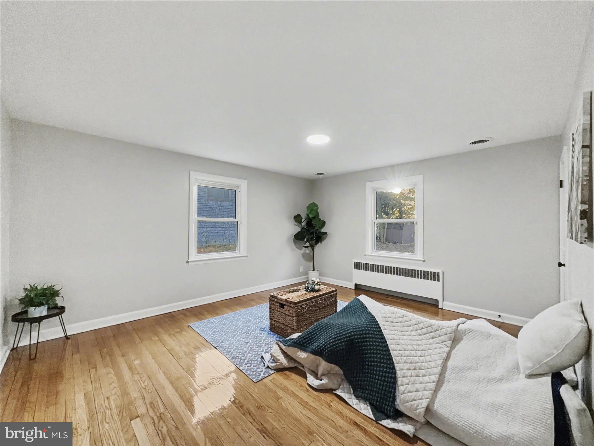 2196 South Queen Street York, PA 17402 - Photo 8 of 28 a bedroom with a bed and a window