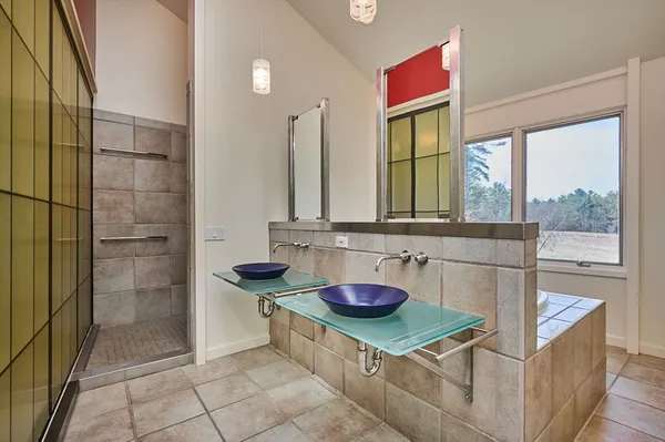 a kitchen with a stove a sink and a refrigerator