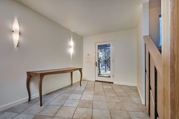 a view of room with furniture and a window