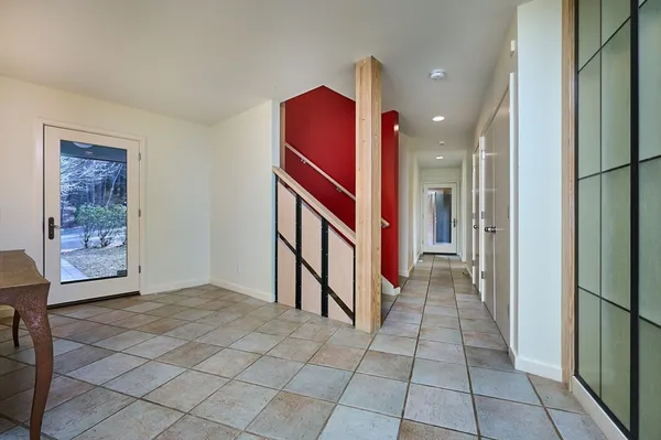 a view of a hallway with entryway
