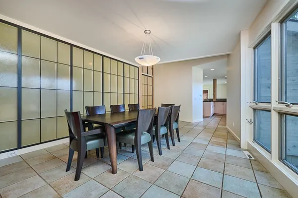 a view of a dining room with furniture