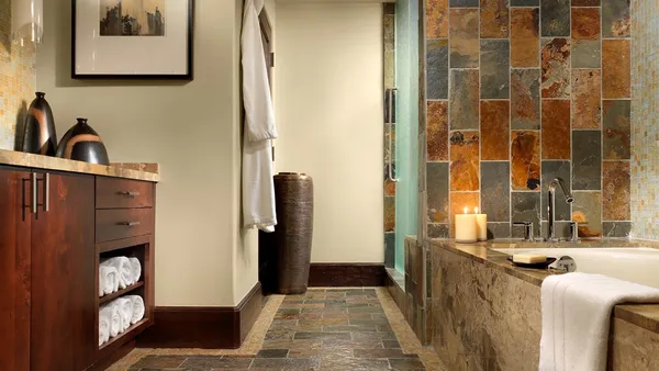 a view of a bathroom with sink and mirror