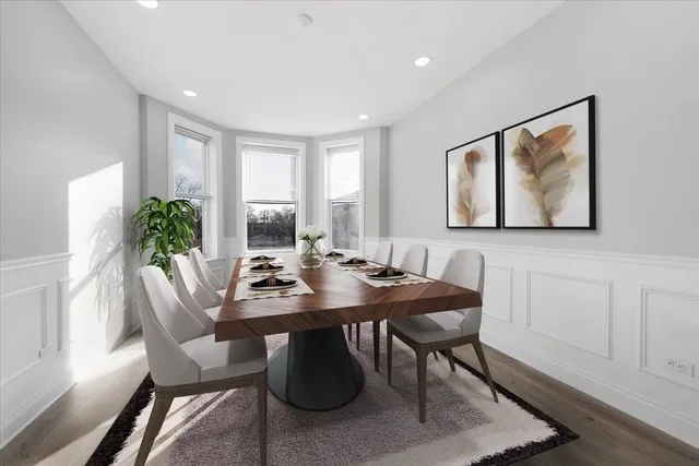 a bathroom with a sink a toilet and a window