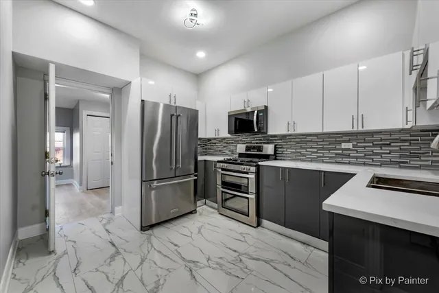a view of kitchen with sink