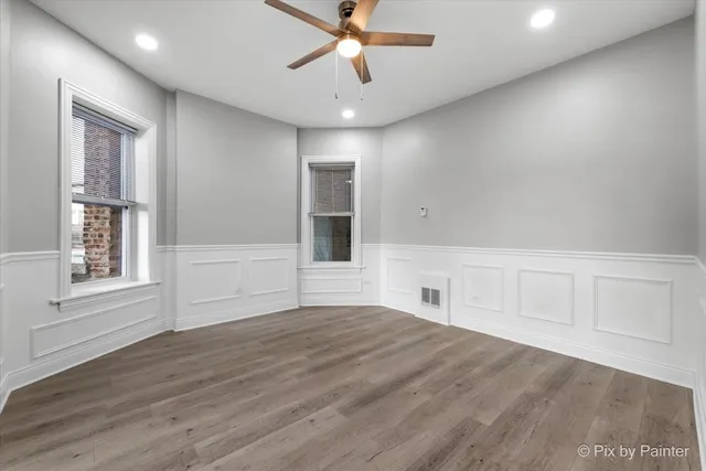 an empty room with a empty space and window