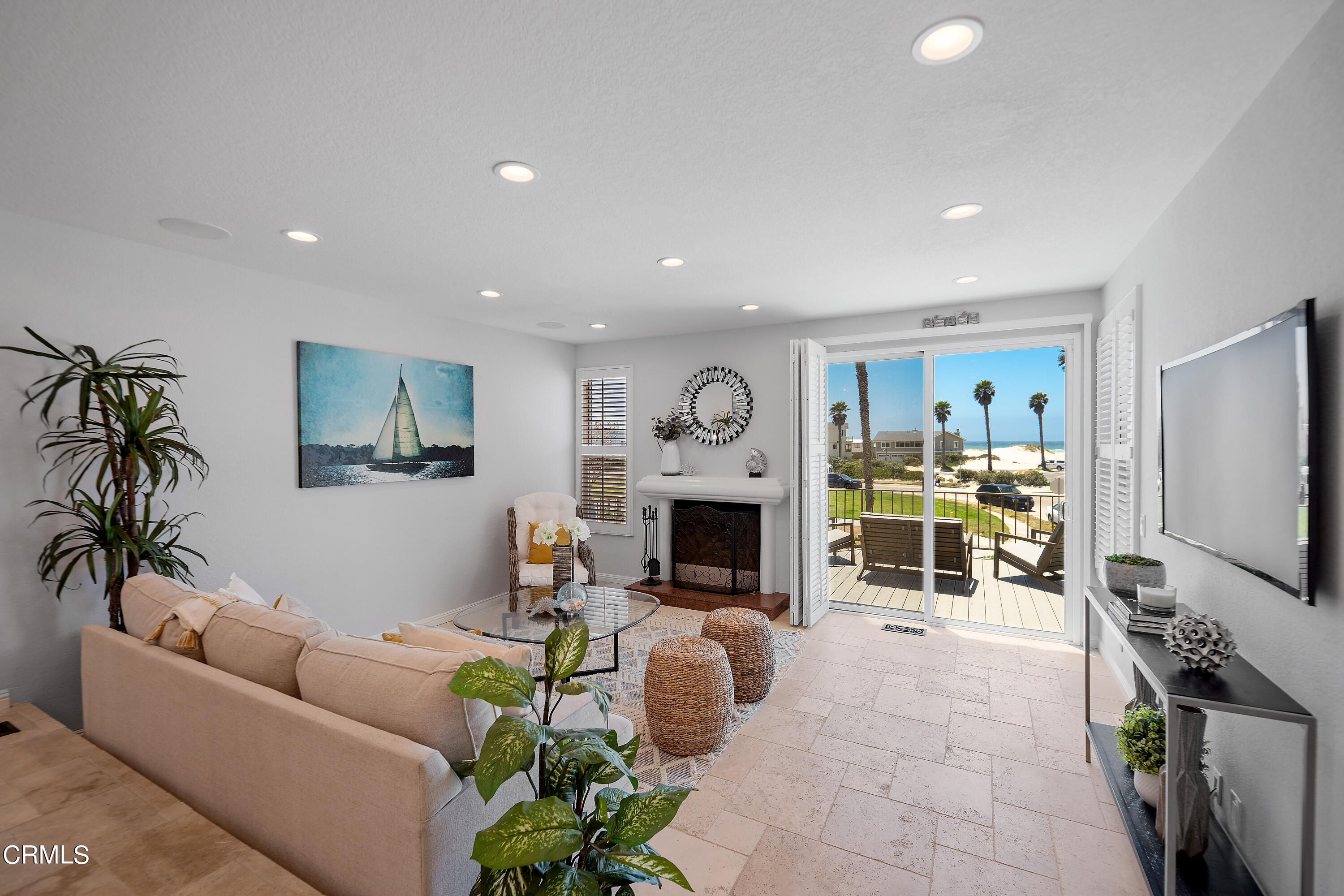 2315 Vina Del Mar Oxnard, CA 93035 - Photo 11 of 53 a living room with furniture a fireplace and a flat screen tv