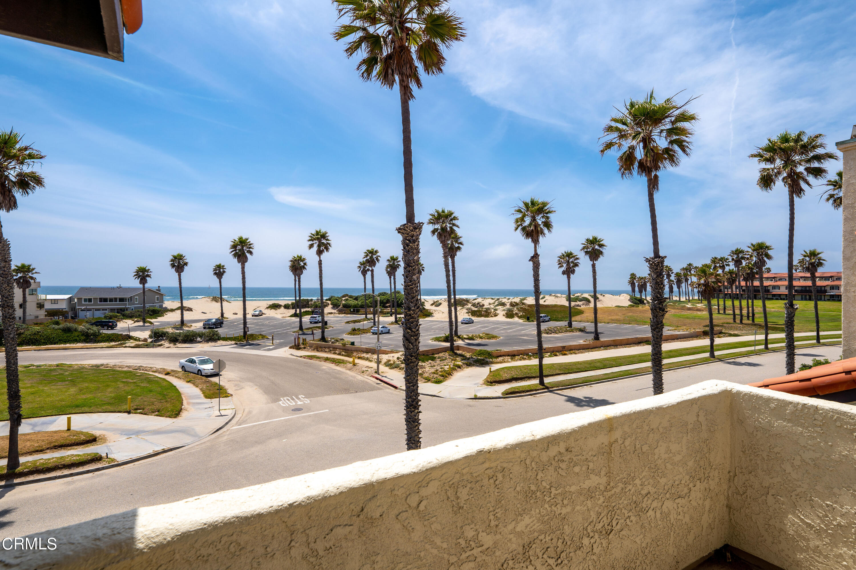 2315 Vina Del Mar Oxnard, CA 93035 - Photo 41 of 53 a view of a swimming pool with a lounge chair and palm trees