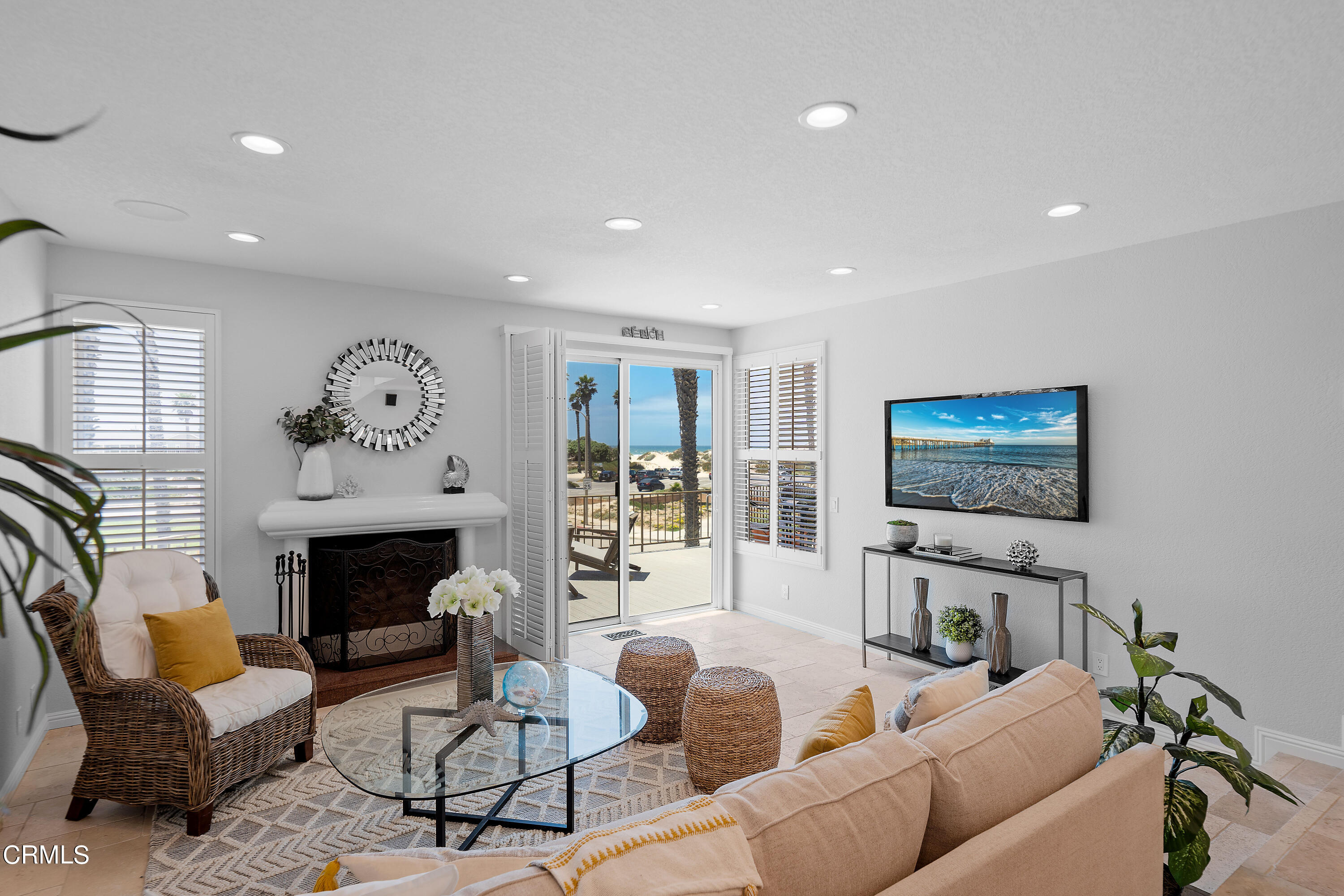 2315 Vina Del Mar Oxnard, CA 93035 - Photo 9 of 53 a living room with furniture a fireplace and a flat screen tv