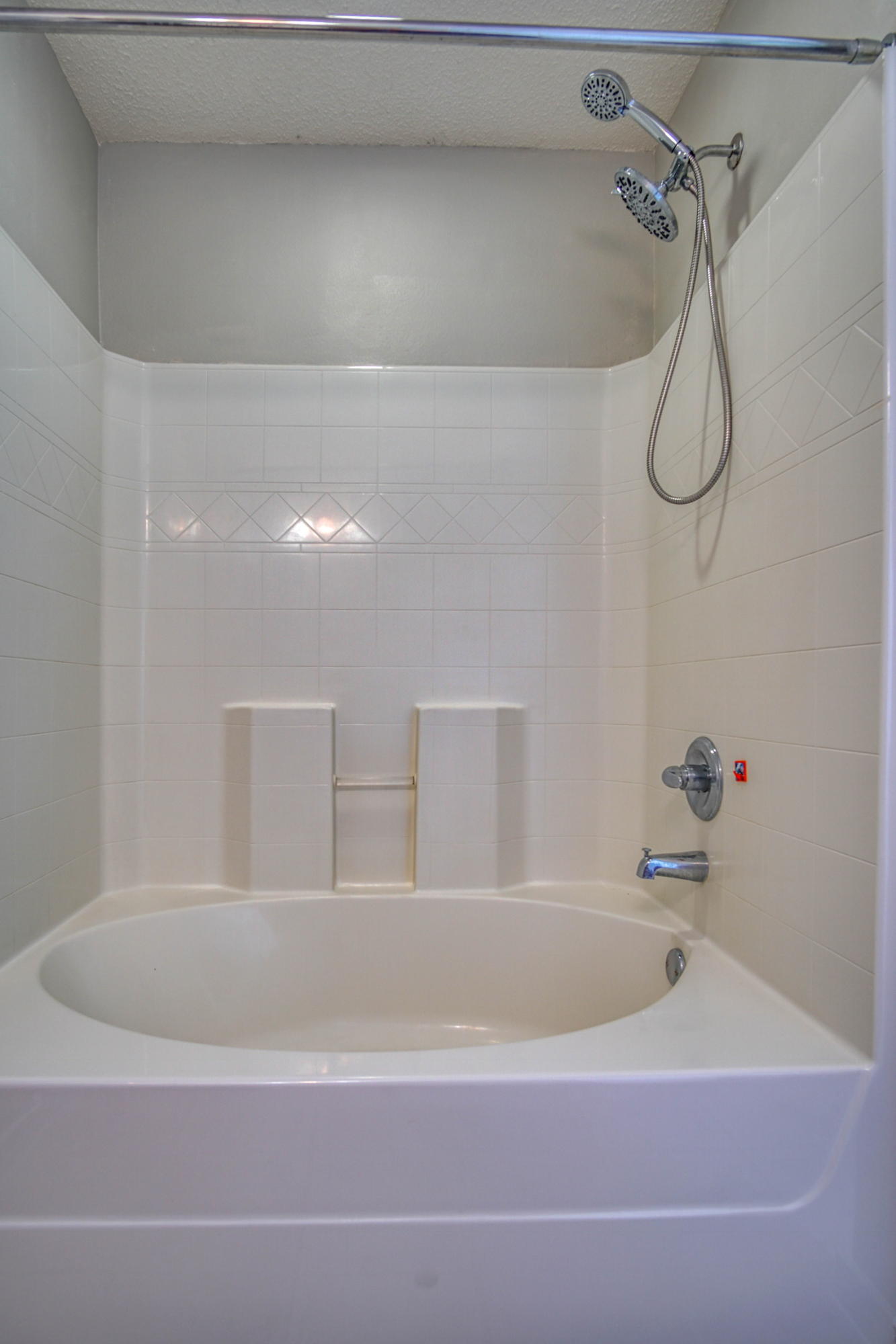 412 Plate Drive Crestview, FL 32539 - Photo 19 of 25 a bathroom with a bathtub and a shower