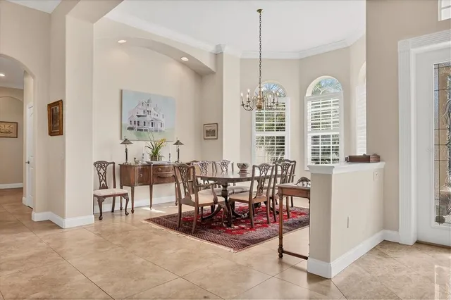 a view of a a dining room with furniture window and outside view