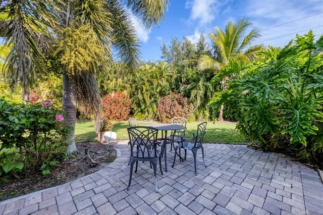 a view of a table and chairs in patio