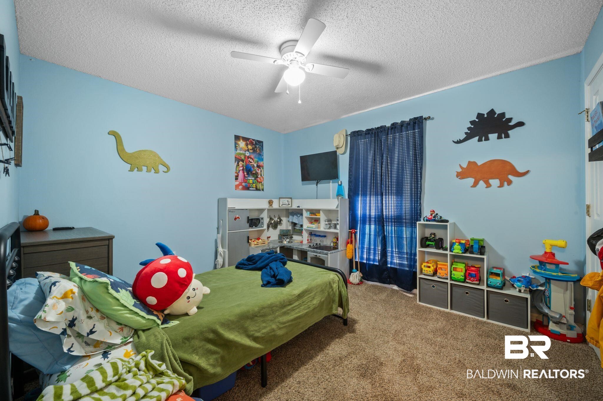13025 County Road 55 Foley, AL 36535 - Photo 5 of 49 Bedroom with ceiling fan, a textured ceiling, and carpet