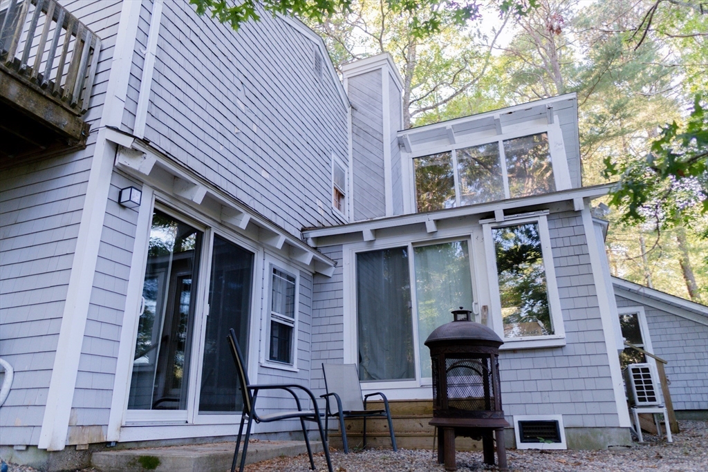 24 Little John Road Falmouth, MA 02536 - Photo 30 of 34 a view of house with outdoor space