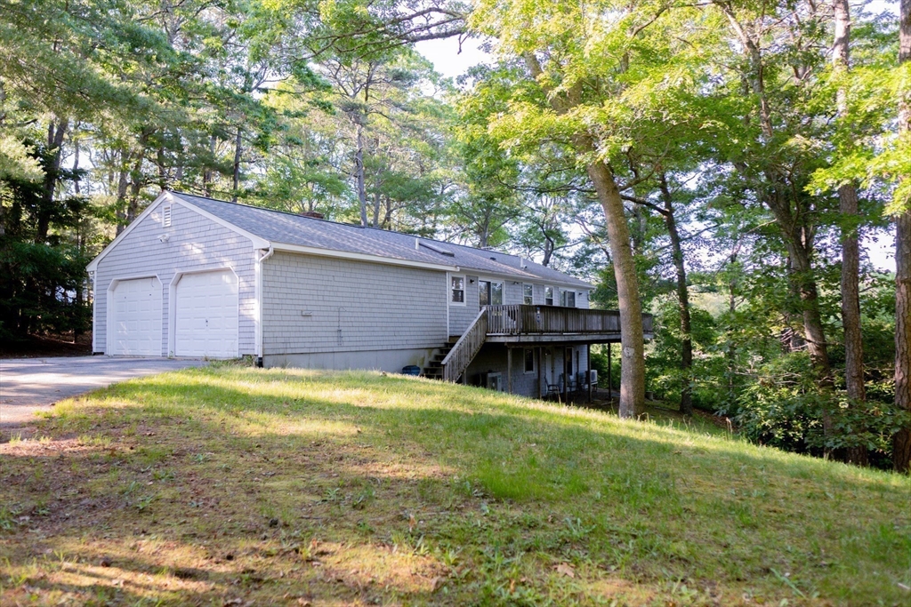 24 Little John Road Falmouth, MA 02536 - Photo 32 of 34 a house view with a outdoor space