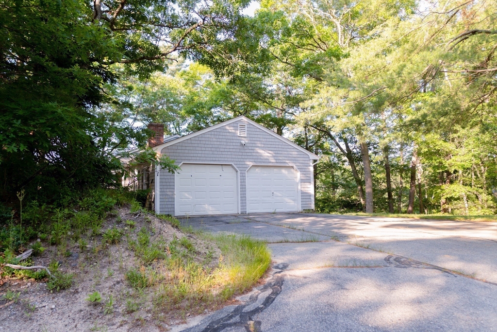 24 Little John Road Falmouth, MA 02536 - Photo 33 of 34 a house view with a outdoor space