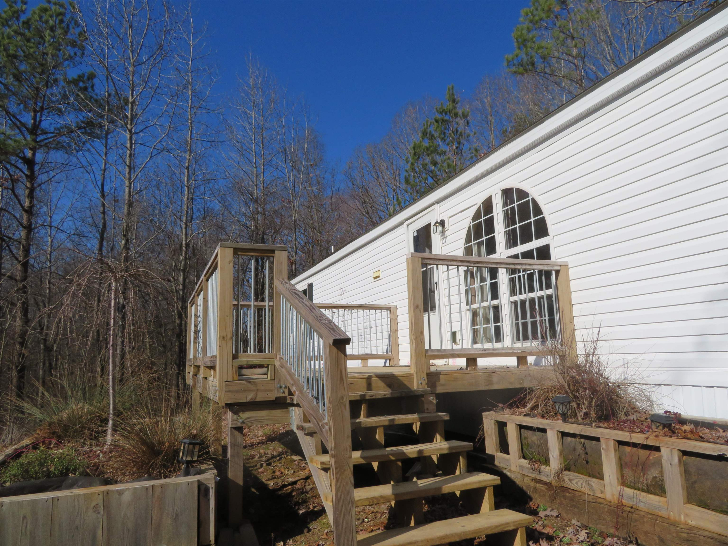 737 Potts Chapel Road Jackson, TN 38305 - Photo 4 of 31 a view of a yard with wooden fence