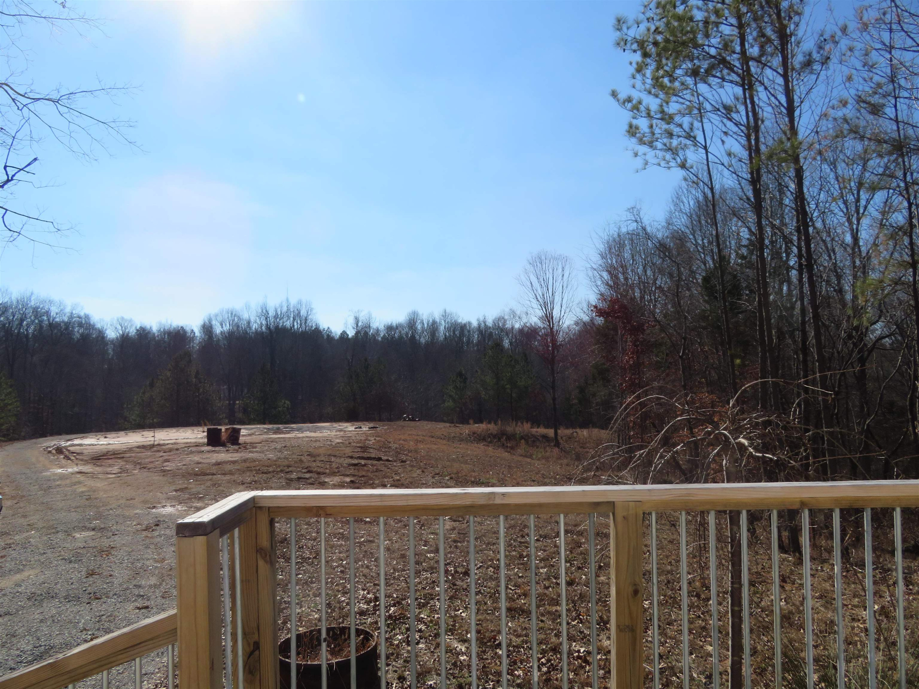 737 Potts Chapel Road Jackson, TN 38305 - Photo 6 of 31 a view of a garden with trees in the background