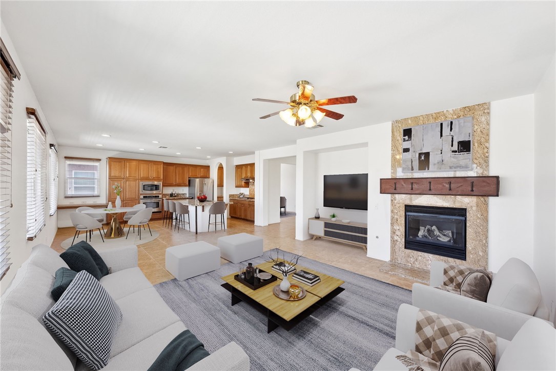 a living room with furniture and a fireplace