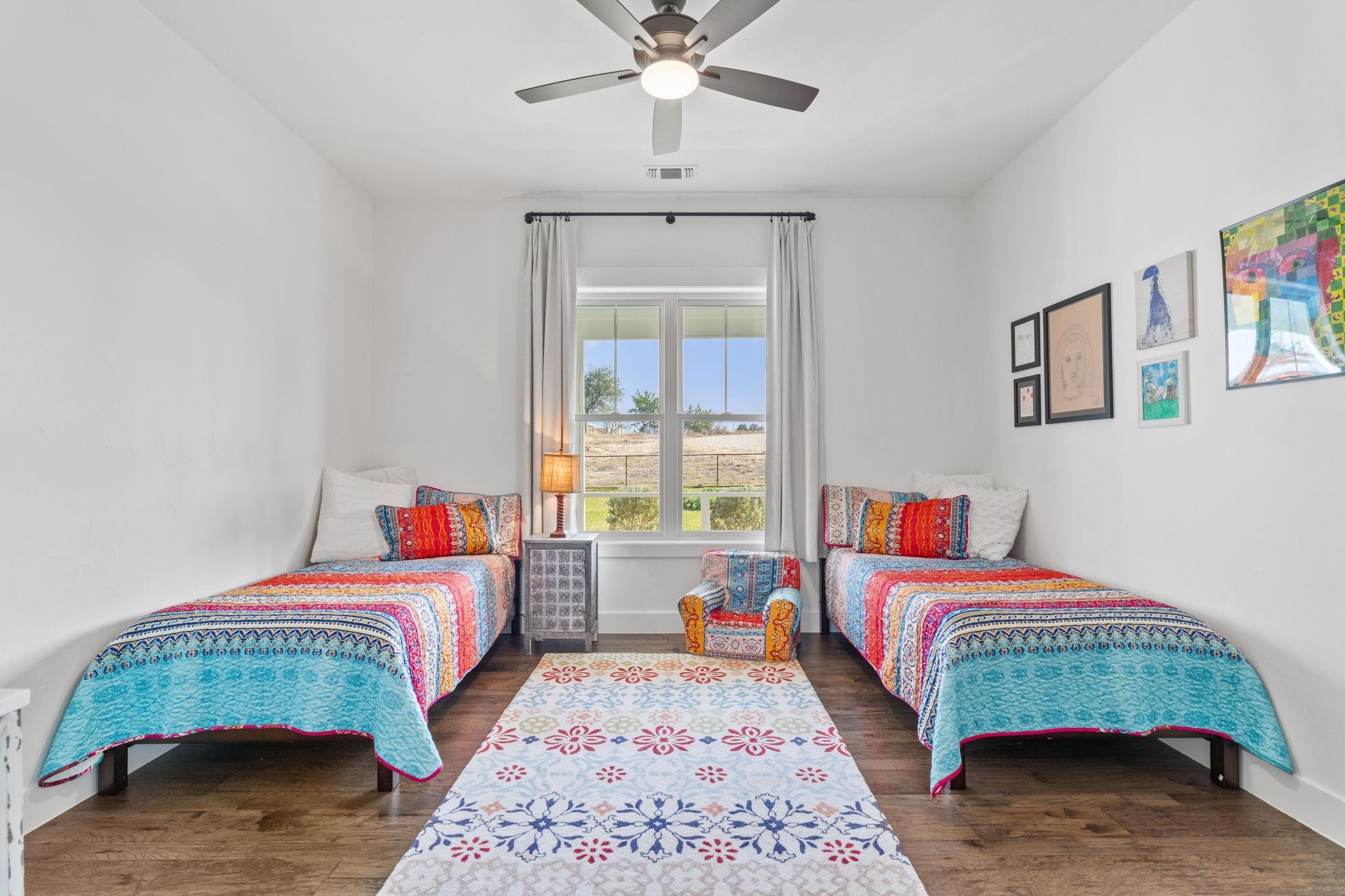 452 Southwick Ranch Road Johnson City, TX 78636 - Photo 20 of 44 a bedroom with bed and a window