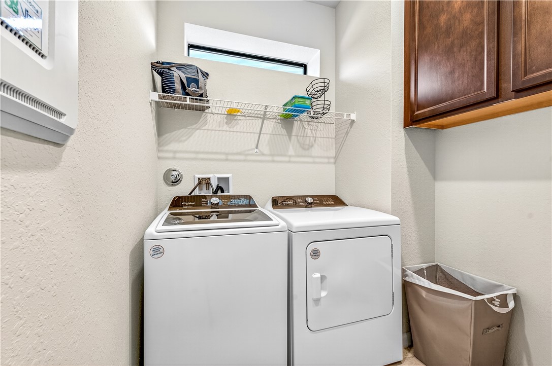 4229 Silver Maple Way Vero Beach, FL 32967 - Photo 26 of 36 a utility room with dryer and washer