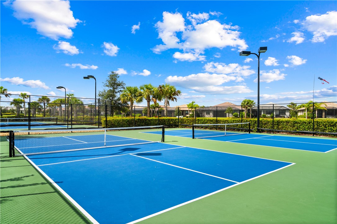 4229 Silver Maple Way Vero Beach, FL 32967 - Photo 34 of 36 a tennis court that has tennis net