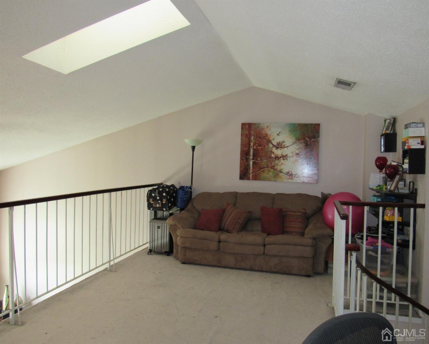 333 Edpas Road New Brunswick, NJ 08901 - Photo 13 of 24 a living room with furniture and a flat screen tv