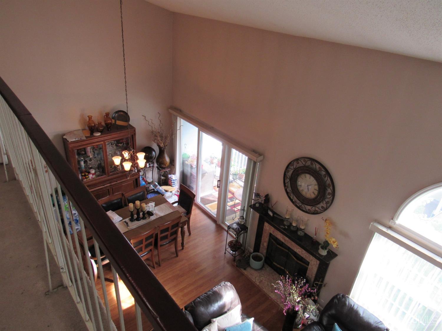 333 Edpas Road New Brunswick, NJ 08901 - Photo 14 of 24 a living room with furniture a rug a fireplace and a large window