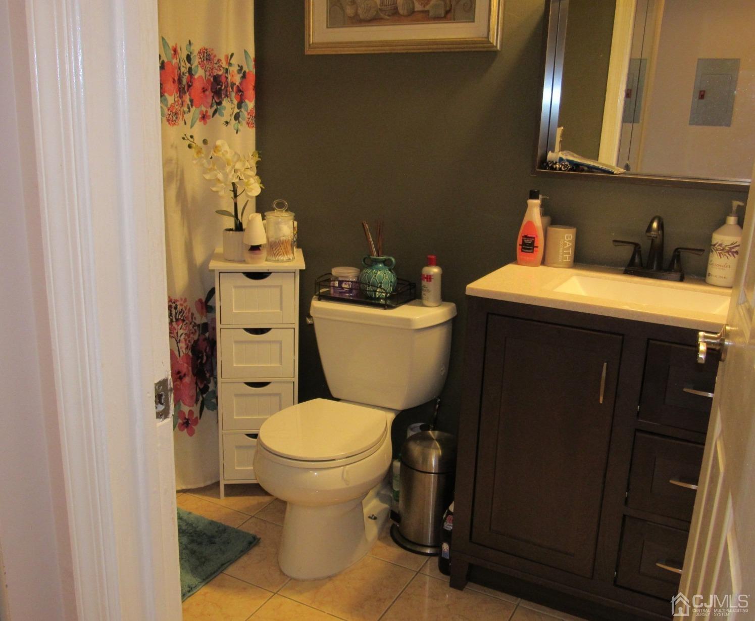 333 Edpas Road New Brunswick, NJ 08901 - Photo 21 of 24 a bathroom with a sink and a toilet