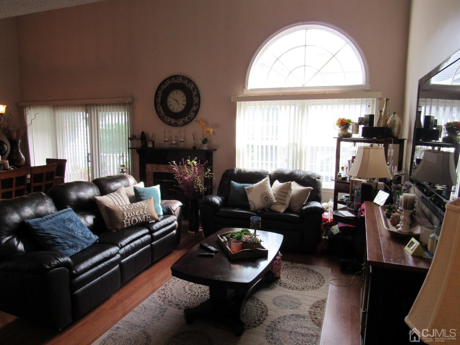 333 Edpas Road New Brunswick, NJ 08901 - Photo 4 of 24 a living room with furniture fireplace and window