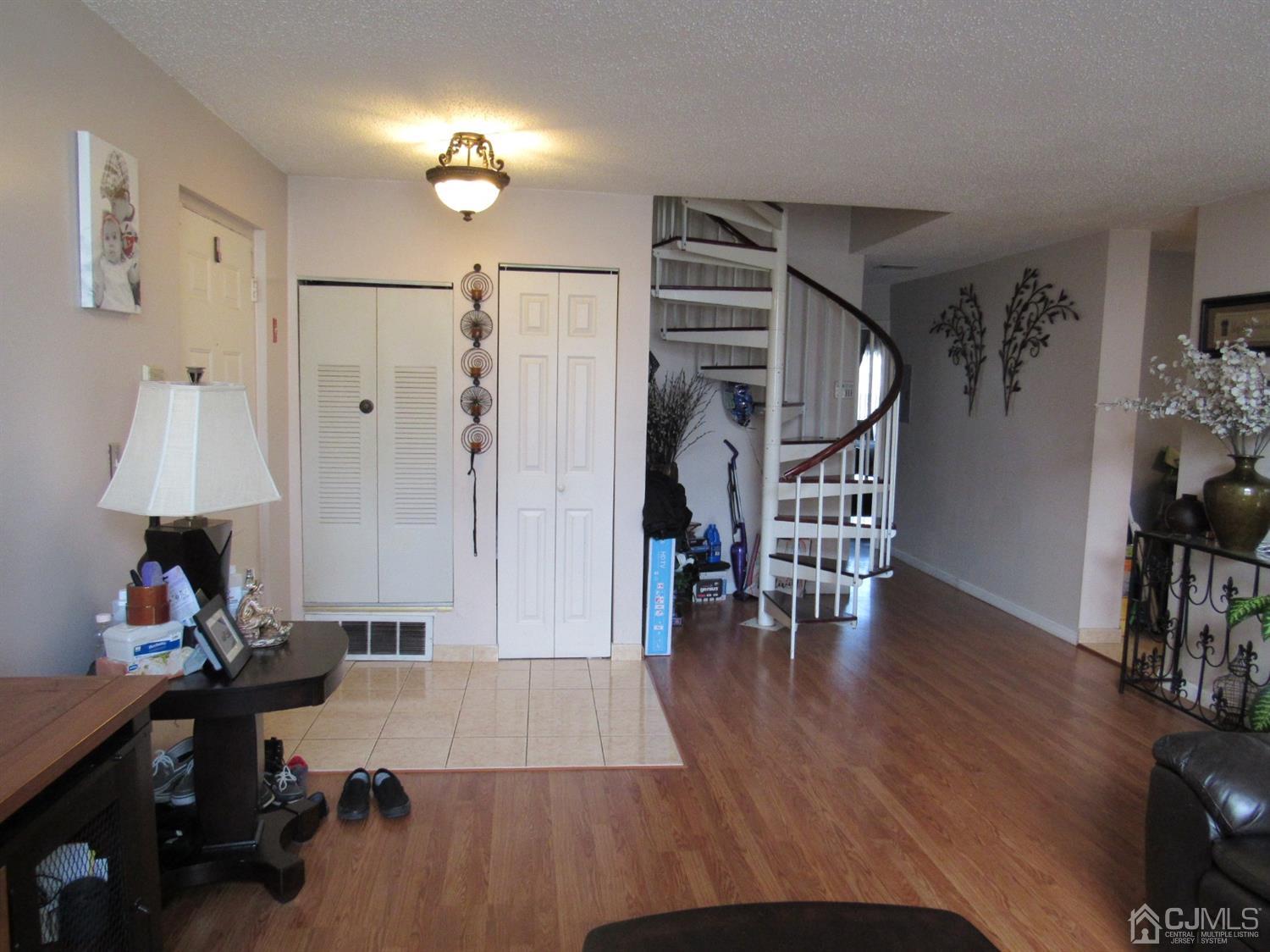 333 Edpas Road New Brunswick, NJ 08901 - Photo 5 of 24 a view of a workspace with furniture and wooden floor