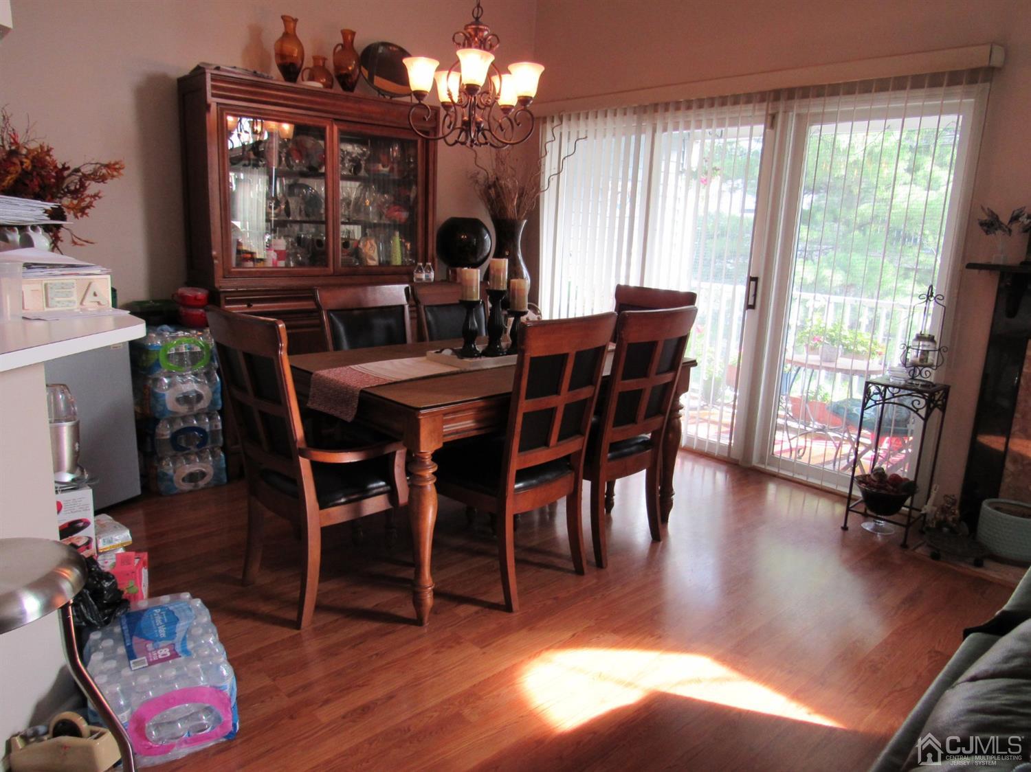 333 Edpas Road New Brunswick, NJ 08901 - Photo 6 of 24 a view of a dining room with furniture window and wooden floor