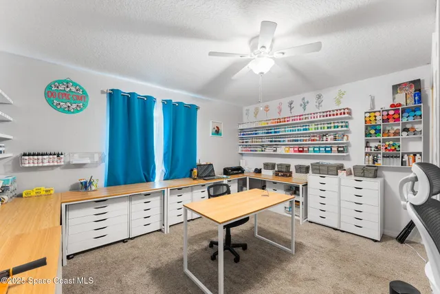 a room with furniture and a chandelier