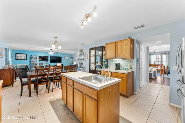 a kitchen with stainless steel appliances lots of counter top space