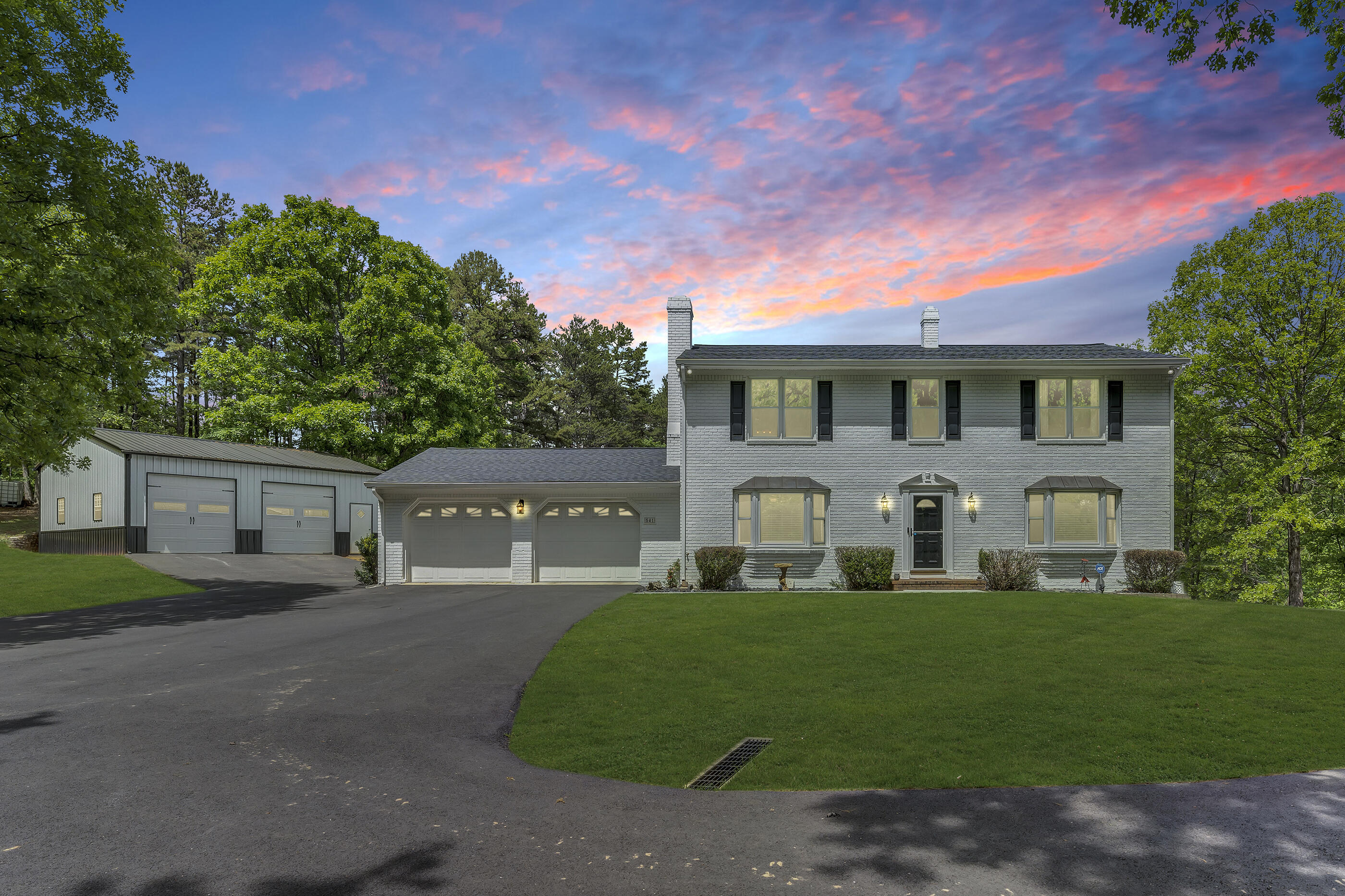 541 Stonehaven Lane Blue Ridge, VA 24064 - Photo 1 of 54 a front view of a house with a garden