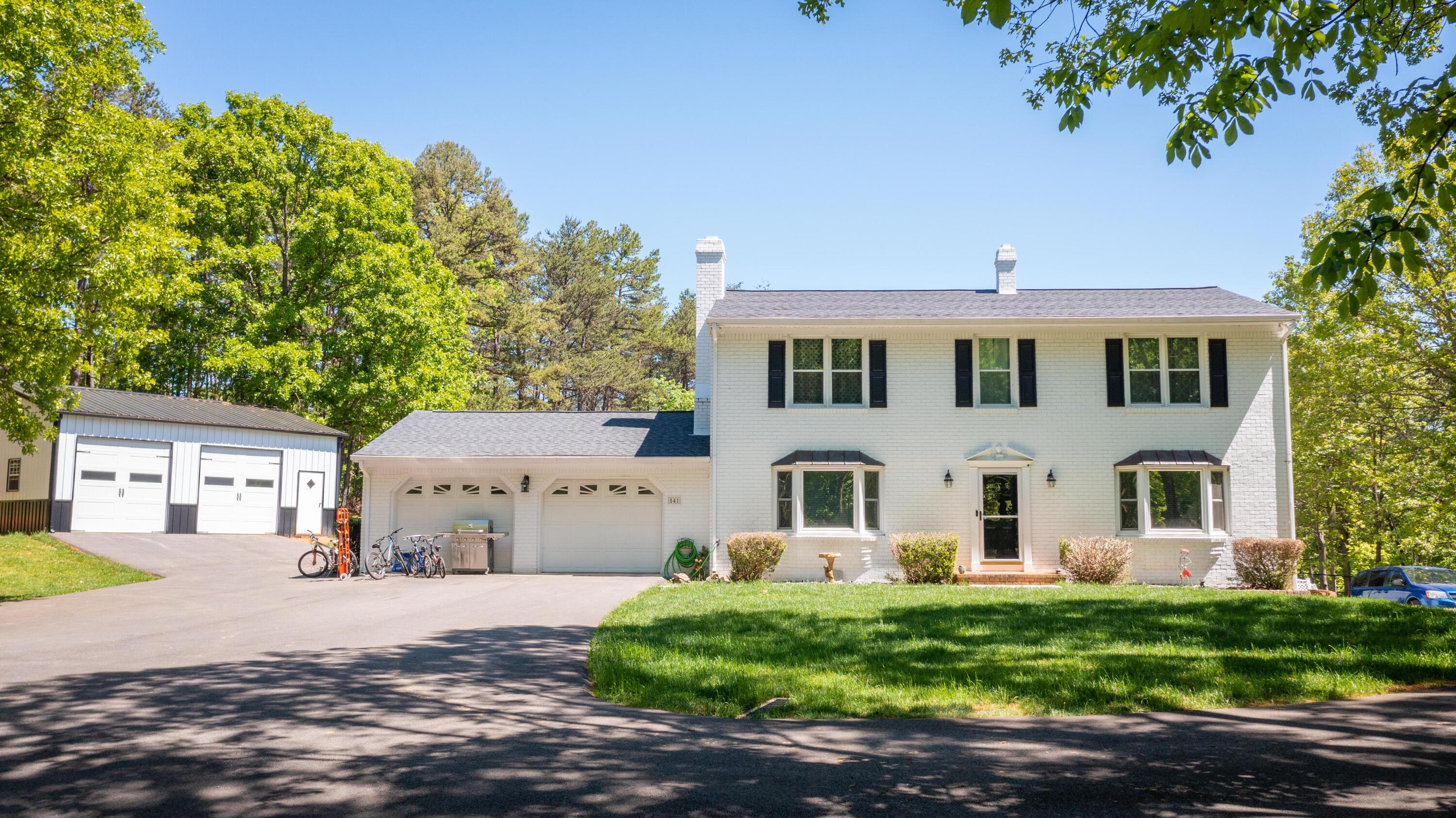 541 Stonehaven Lane Blue Ridge, VA 24064 - Photo 54 of 54 a view of a big house with a street