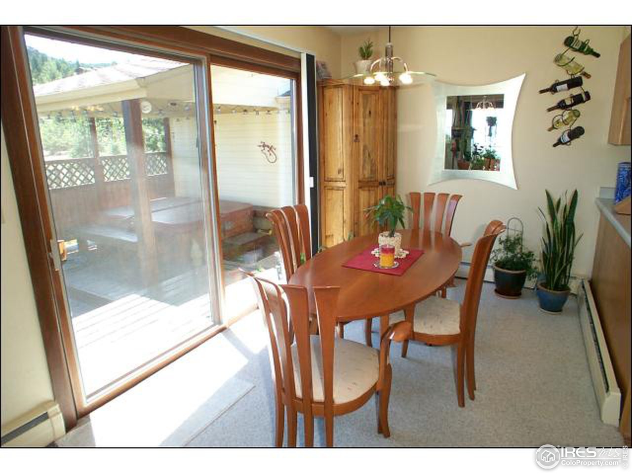 303 Deer Trail Road Boulder, CO 80302 - Photo 6 of 9 a dining room with furniture and wooden floor