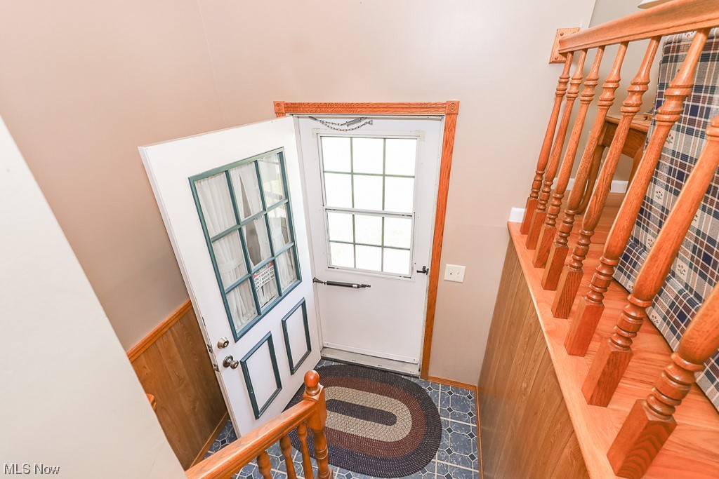 1826 Sandgate Road Madison, OH 44057 - Photo 10 of 29 Tiled entryway with a high ceiling