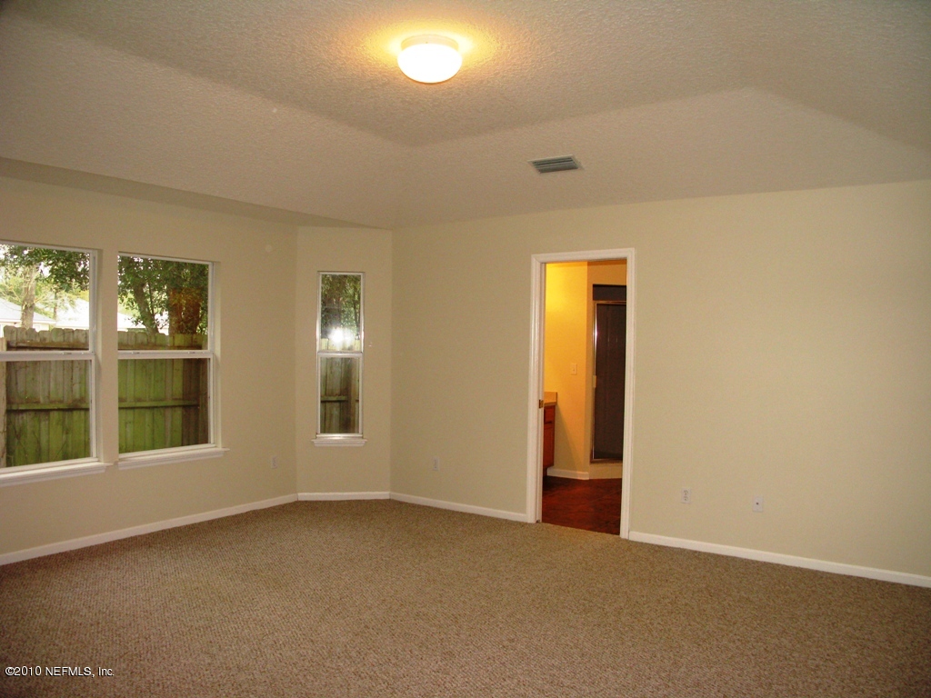 846 Pine Moss Road Jacksonville, FL 32218 - Photo 25 of 29 Master Bedroom