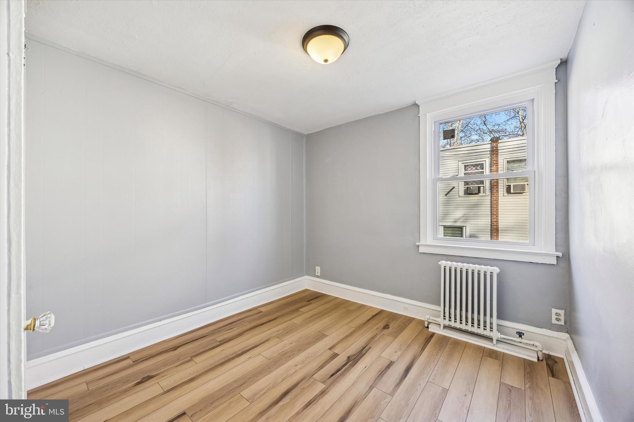 433 Copley Road Upper Darby, PA 19082 - Photo 15 of 35 a view of a room with wooden floor and window