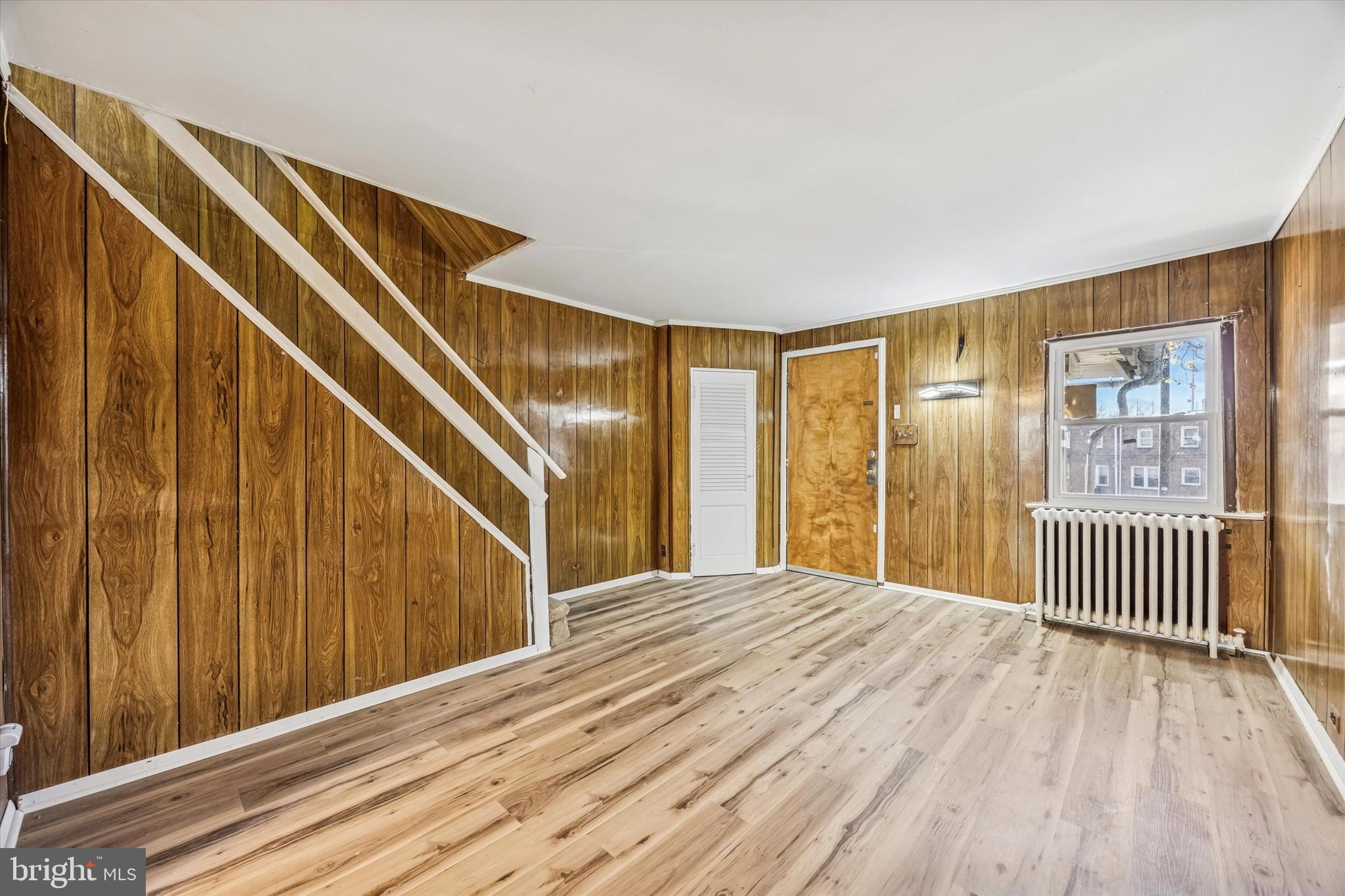 433 Copley Road Upper Darby, PA 19082 - Photo 8 of 35 a view of a room with wooden floor and windows
