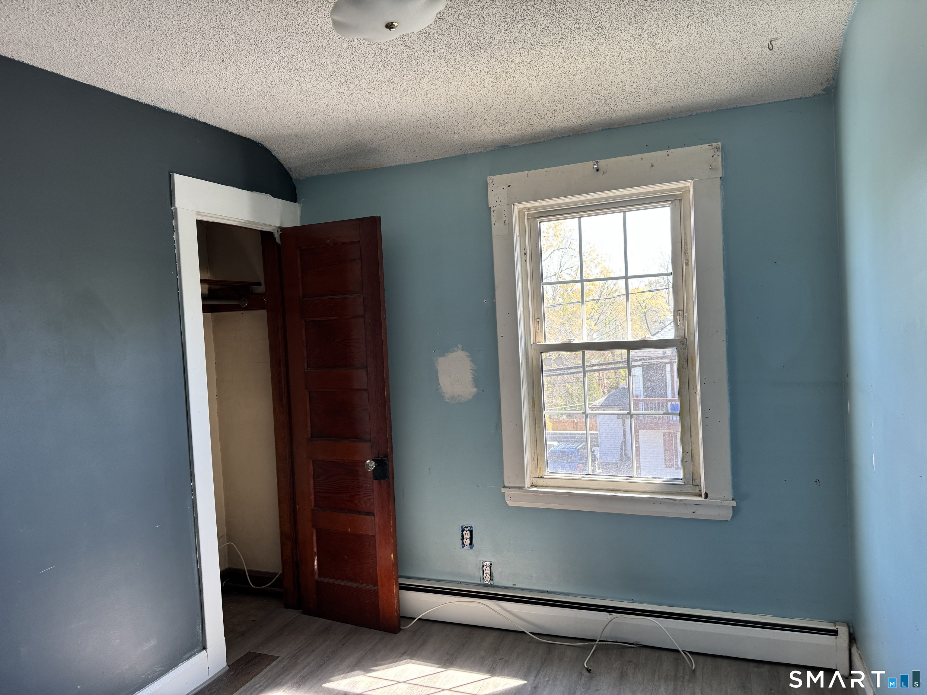 138 Greene Street Bristol, CT 06010 - Photo 20 of 32 an empty room with window and closet