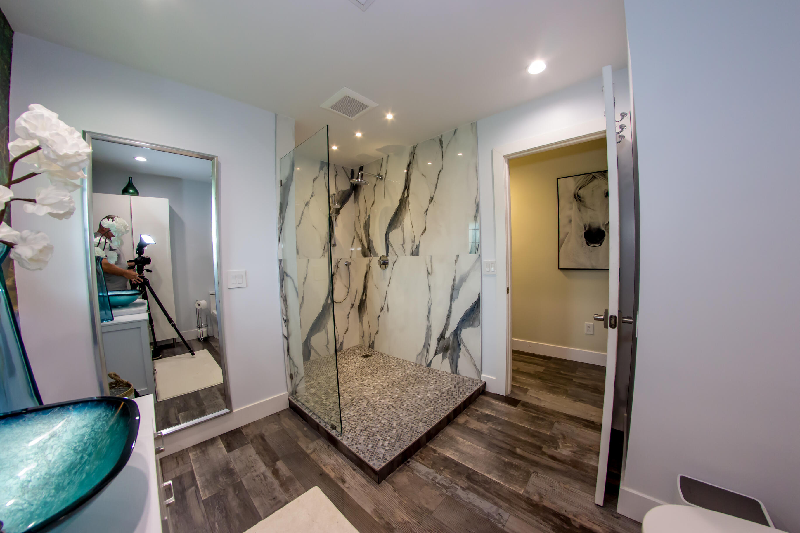 661 West Rambling Drive Wellington, FL 33414 - Photo 21 of 33 a view of a hallway with wooden floor and stairs