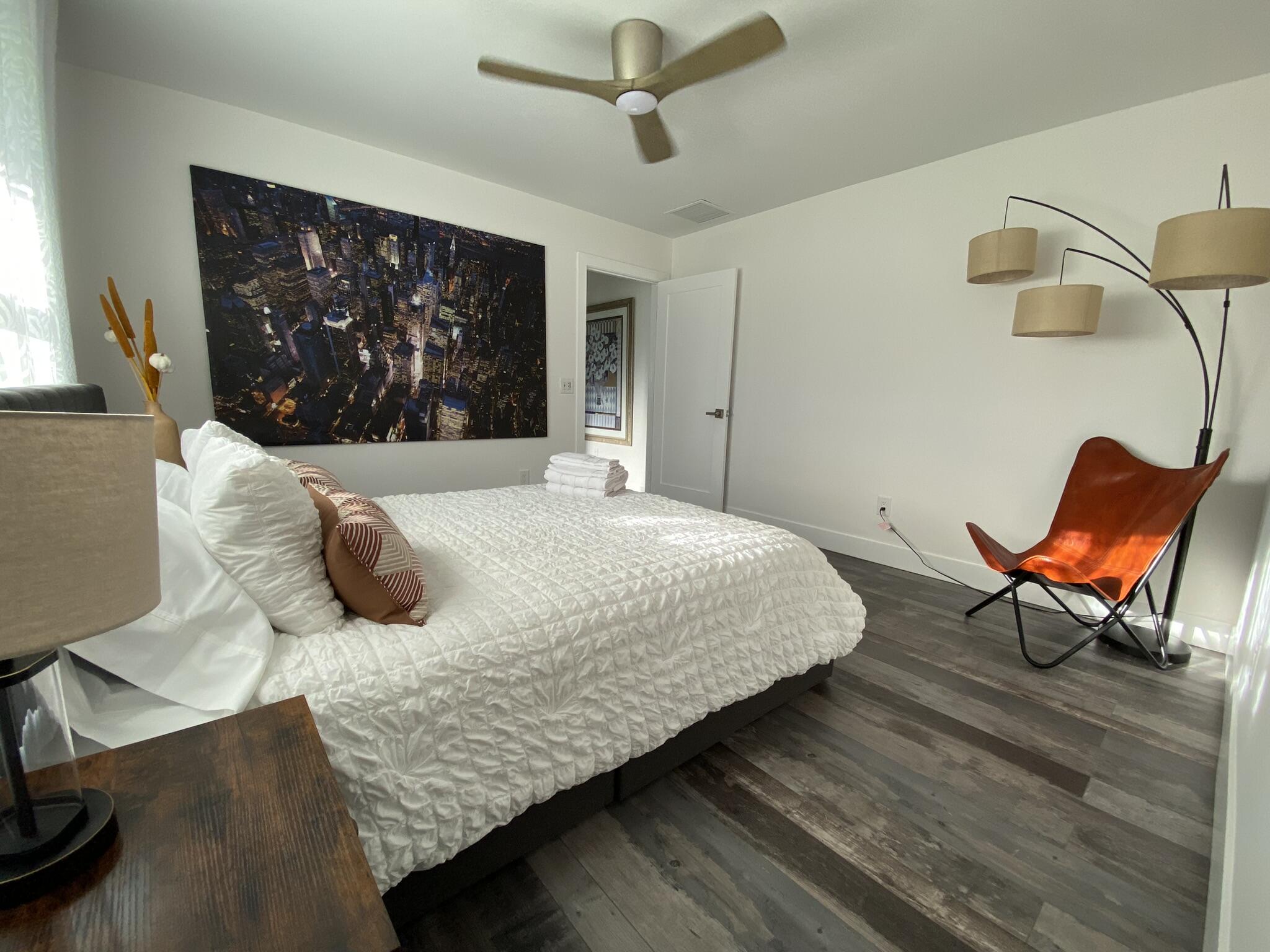 661 West Rambling Drive Wellington, FL 33414 - Photo 24 of 33 a bedroom with a bed window and couch