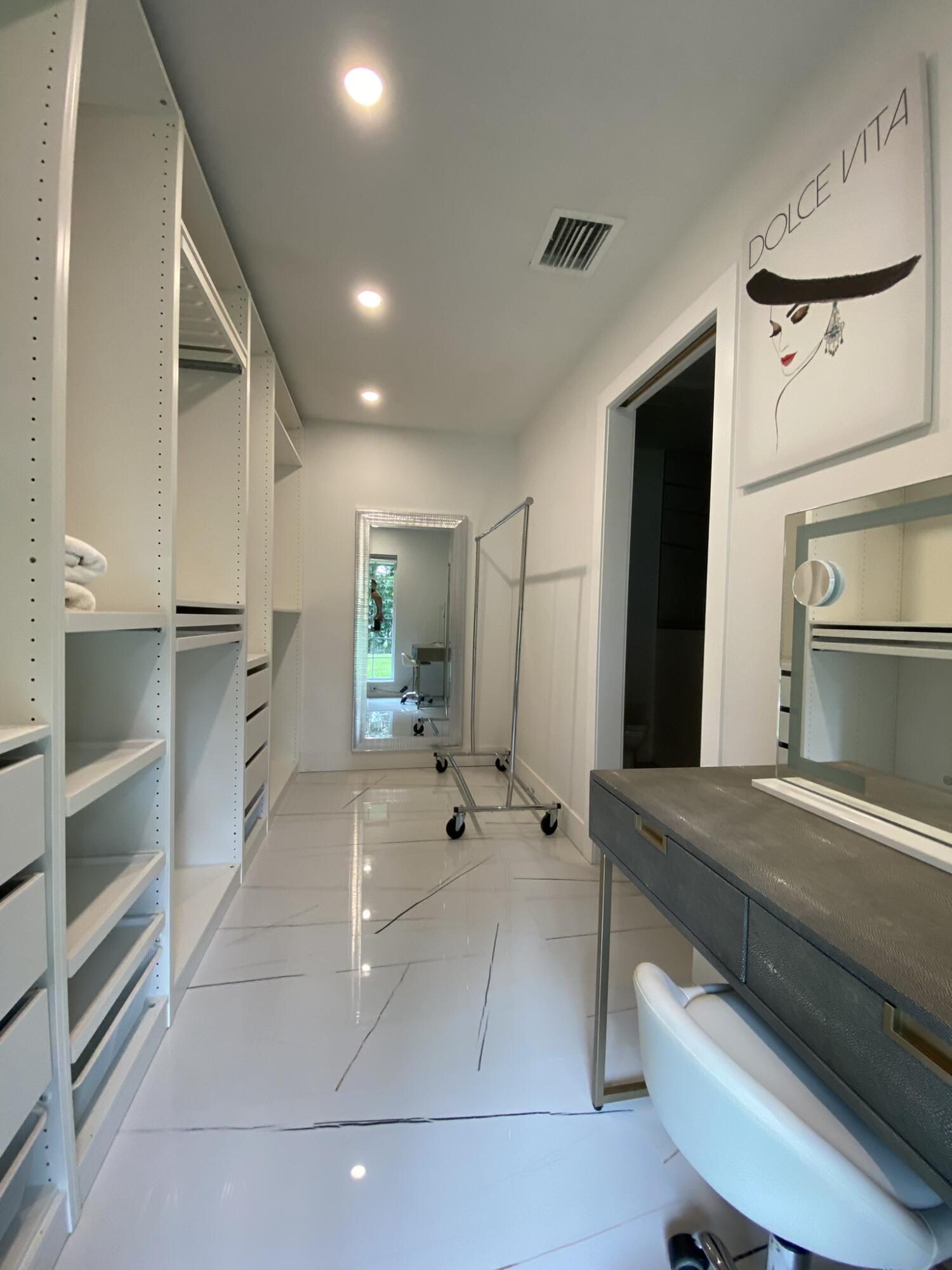 661 West Rambling Drive Wellington, FL 33414 - Photo 29 of 33 a bathroom with a sink a toilet and shower