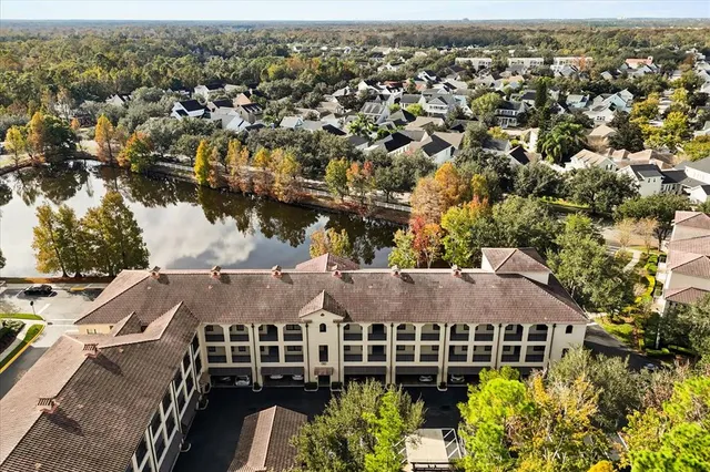 an aerial view of a house with a garden